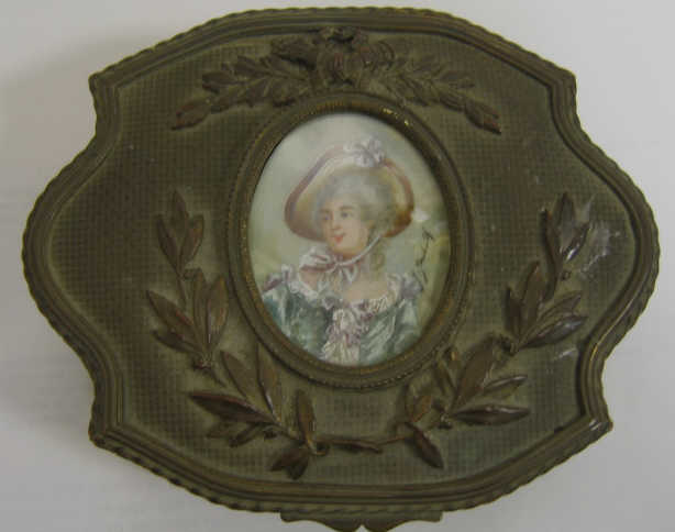 Appraisal: FRENCH PORTRAIT JEWELRY BOX Gilt brass cartouche shaped box decorated