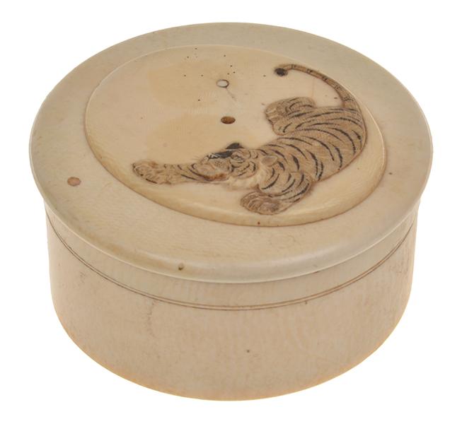 Appraisal: JAPANESE IVORY CIRCULAR COVERED BOX WITH CARVED TIGER MOTIF TO