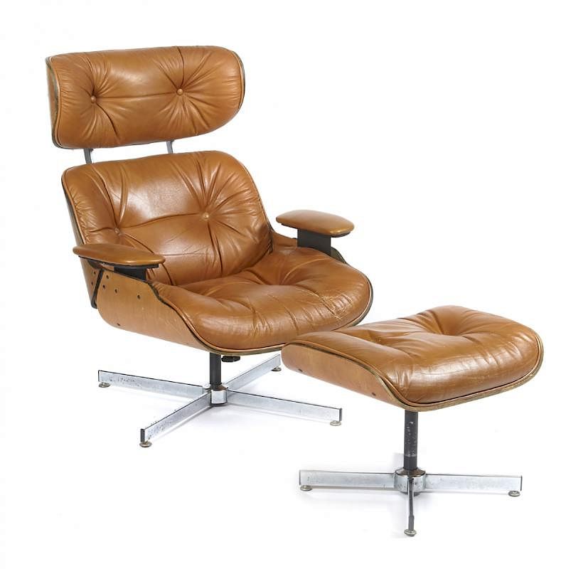 Appraisal: Eames style lounge chair and ottoman walnut Eames style lounge