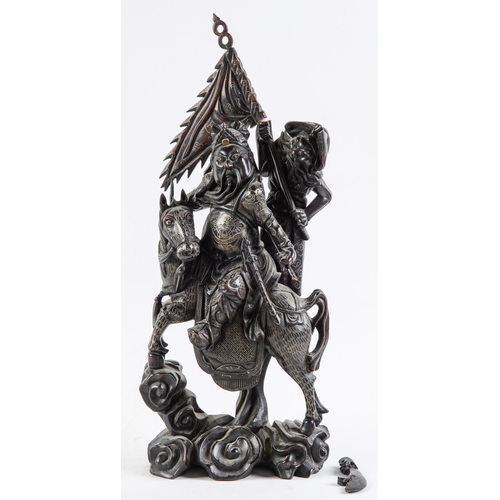 Appraisal: A Chinese carved hardwood and silver wire inlaid sculpture of