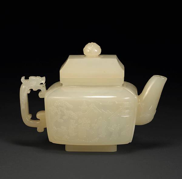 Appraisal: A white jade covered teapot dragon handle Of rectangular section