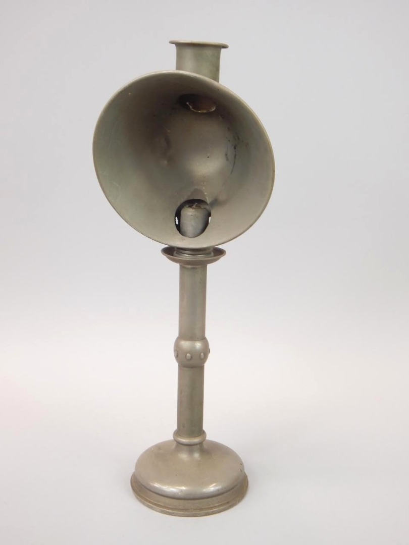 Appraisal: A Victorian pewter candlestick with shade cm high