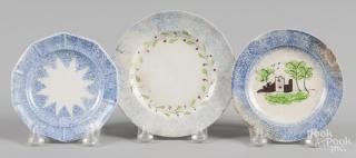 Appraisal: Three blue spatter toddy plates with fort star and wreath