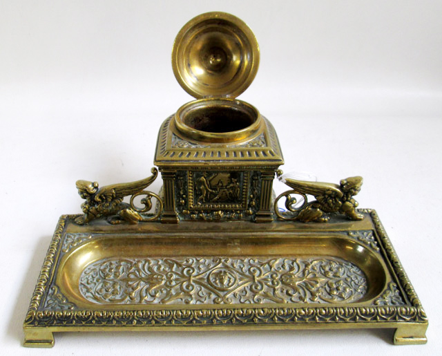 Appraisal: BRASS INKSTAND with sphinx and Roman motif having inkwell and