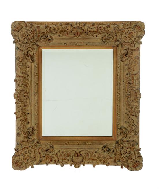 Appraisal: MIRROR Twentieth century softwood Elaborately carved and gessoed with distressed