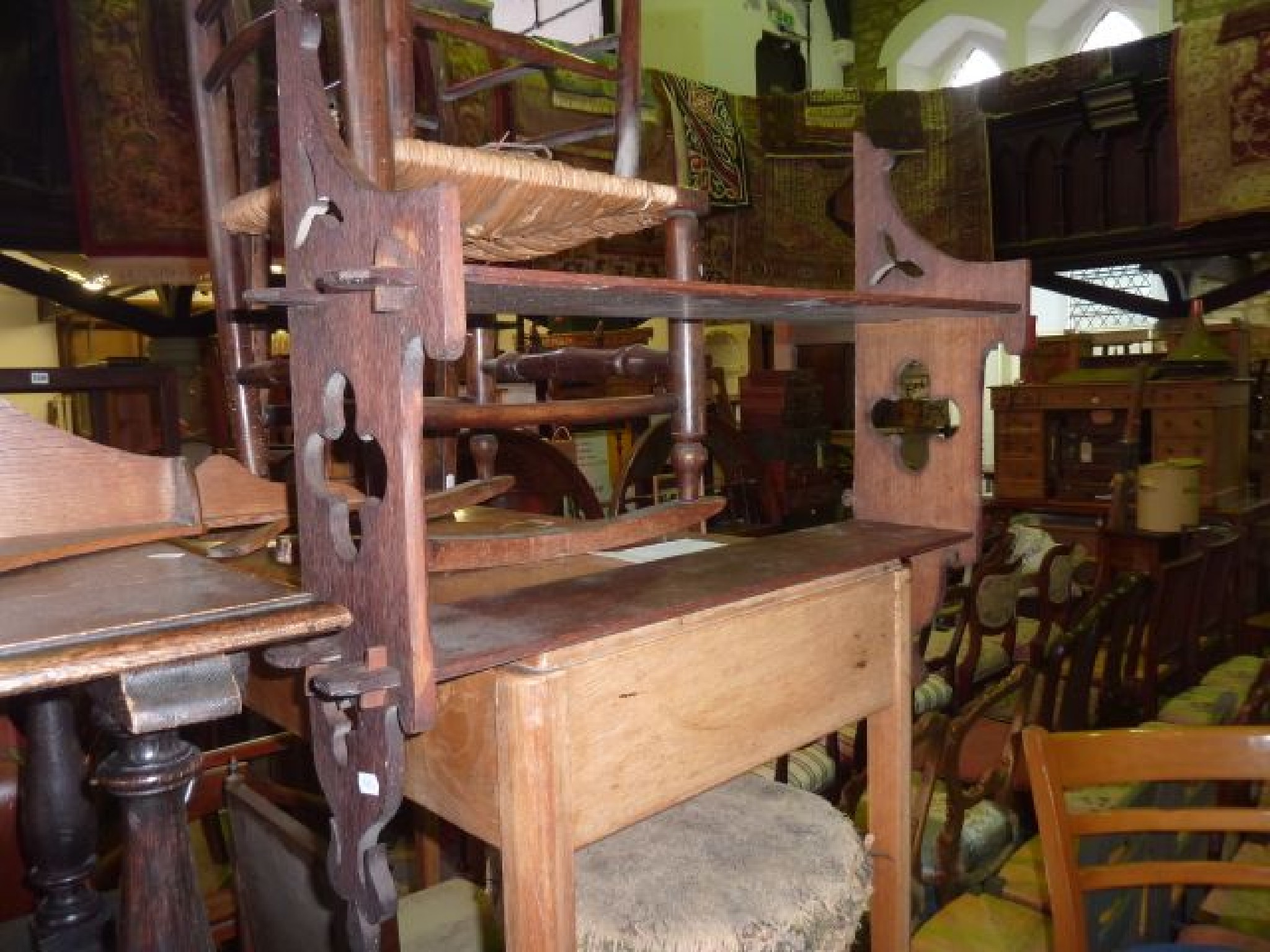 Appraisal: A Victorian open bookshelf on two tiers with shaped and