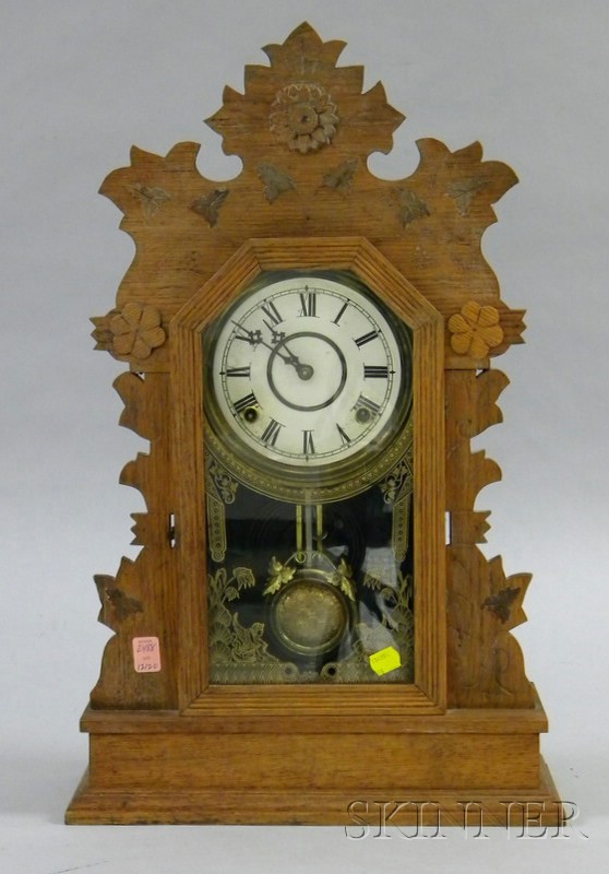 Appraisal: Oak Case Gingerbread Clock with Roman numerals gilt transfer decorated