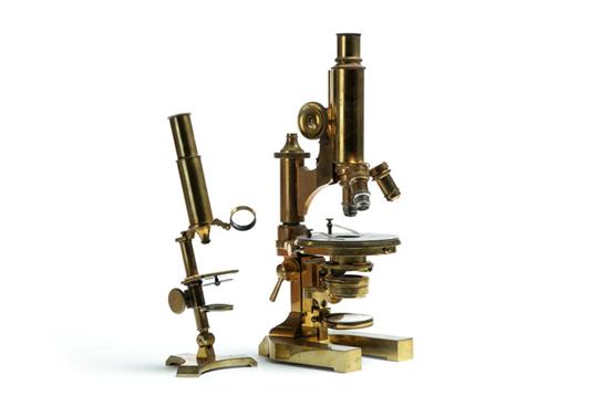 Appraisal: TWO BRASS MICROSCOPES American or European th century brass A