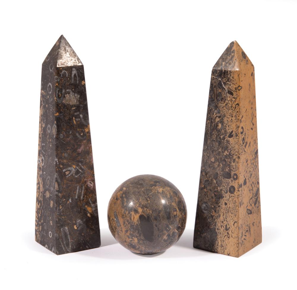 Appraisal: Pair of Fossilized Marble Obelisks and Sphere th c made