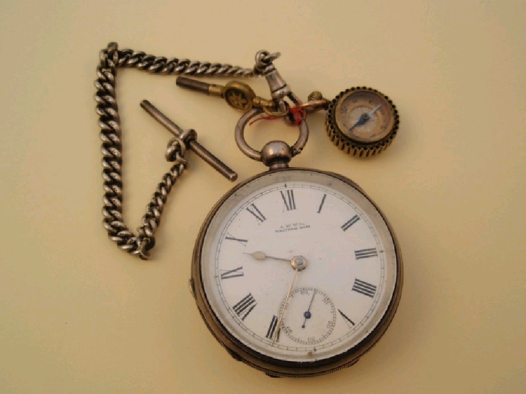 Appraisal: A Waltham silver open face pocket watch together with a