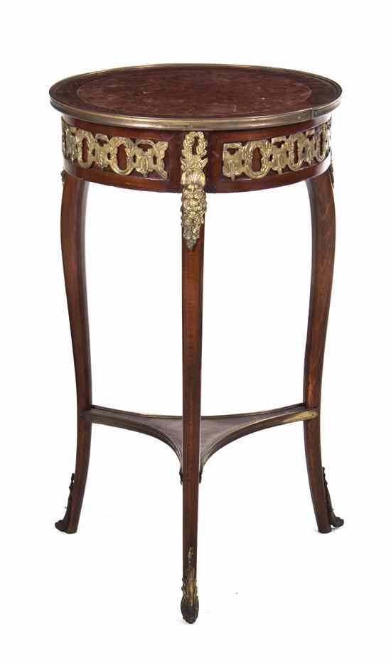 Appraisal: A Louis XVI Style Gilt Metal Mounted Parquetry Occasional Table