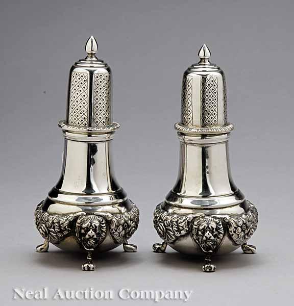 Appraisal: A Pair of Sterling Silver Castors each a variation of