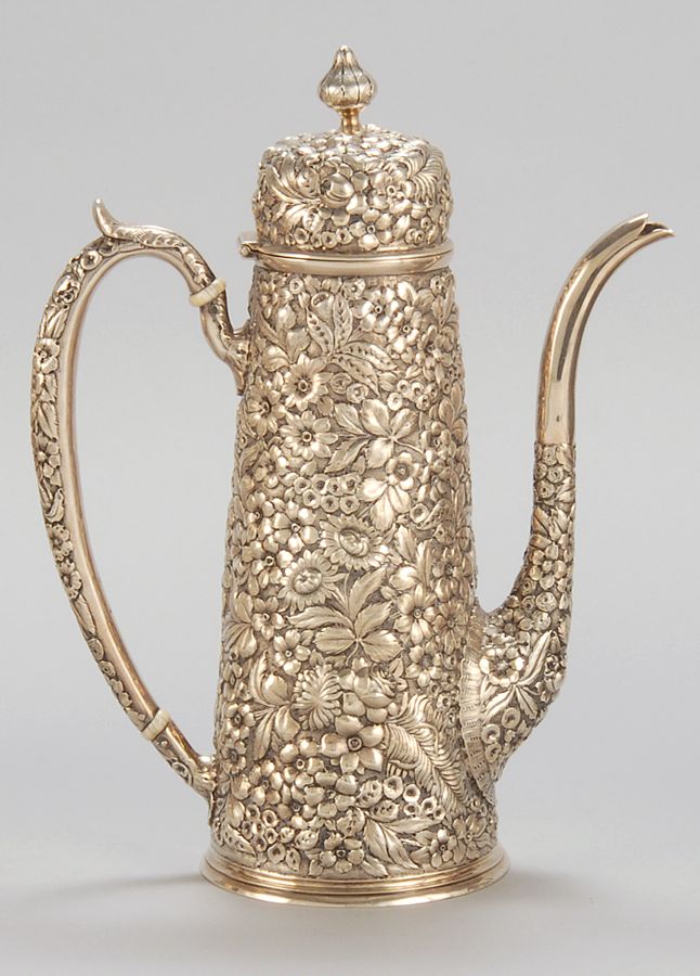 Appraisal: AMERICAN SILVER DEMITASSE COFFEEPOT In lighthouse form with repousse floral