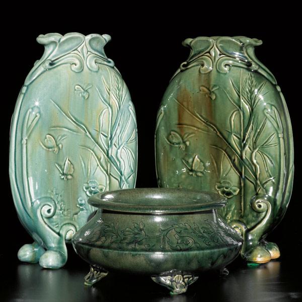 Appraisal: CHELSEA KERAMIC ART WORKS Pair of pillow vases embossed with