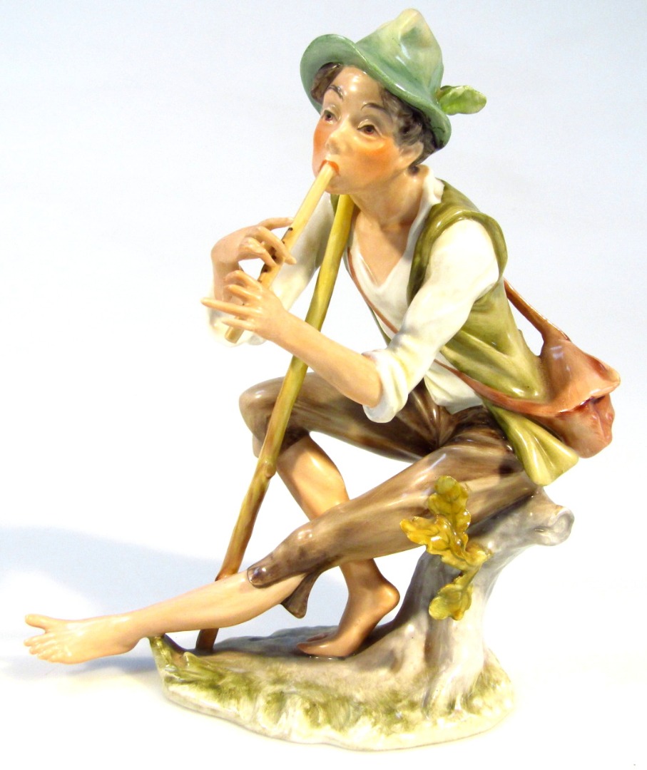 Appraisal: A thC Kaiser porcelain figure of a gentleman playing horn