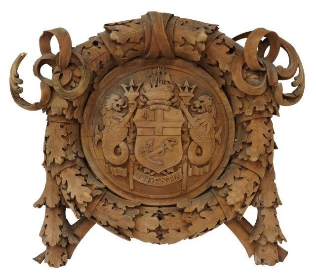 Appraisal: English carved wood architectural element coat of arms of the