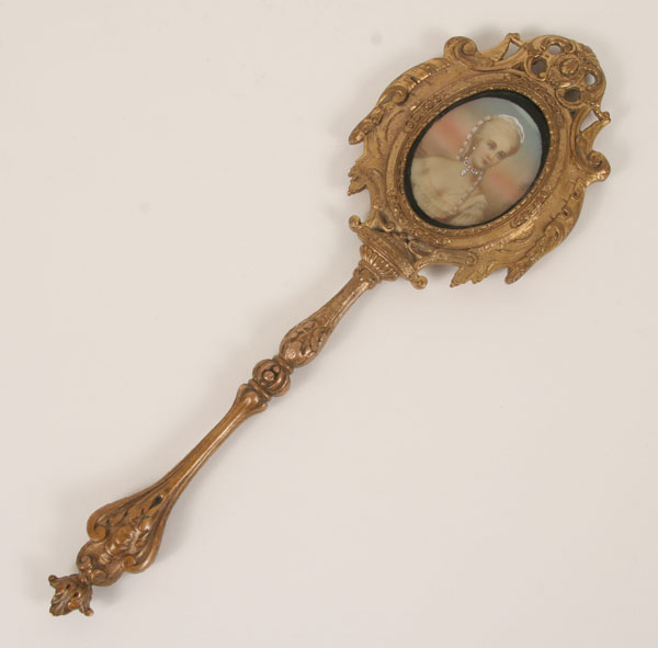 Appraisal: French gilt bronze hand mirror with a portrait miniature the