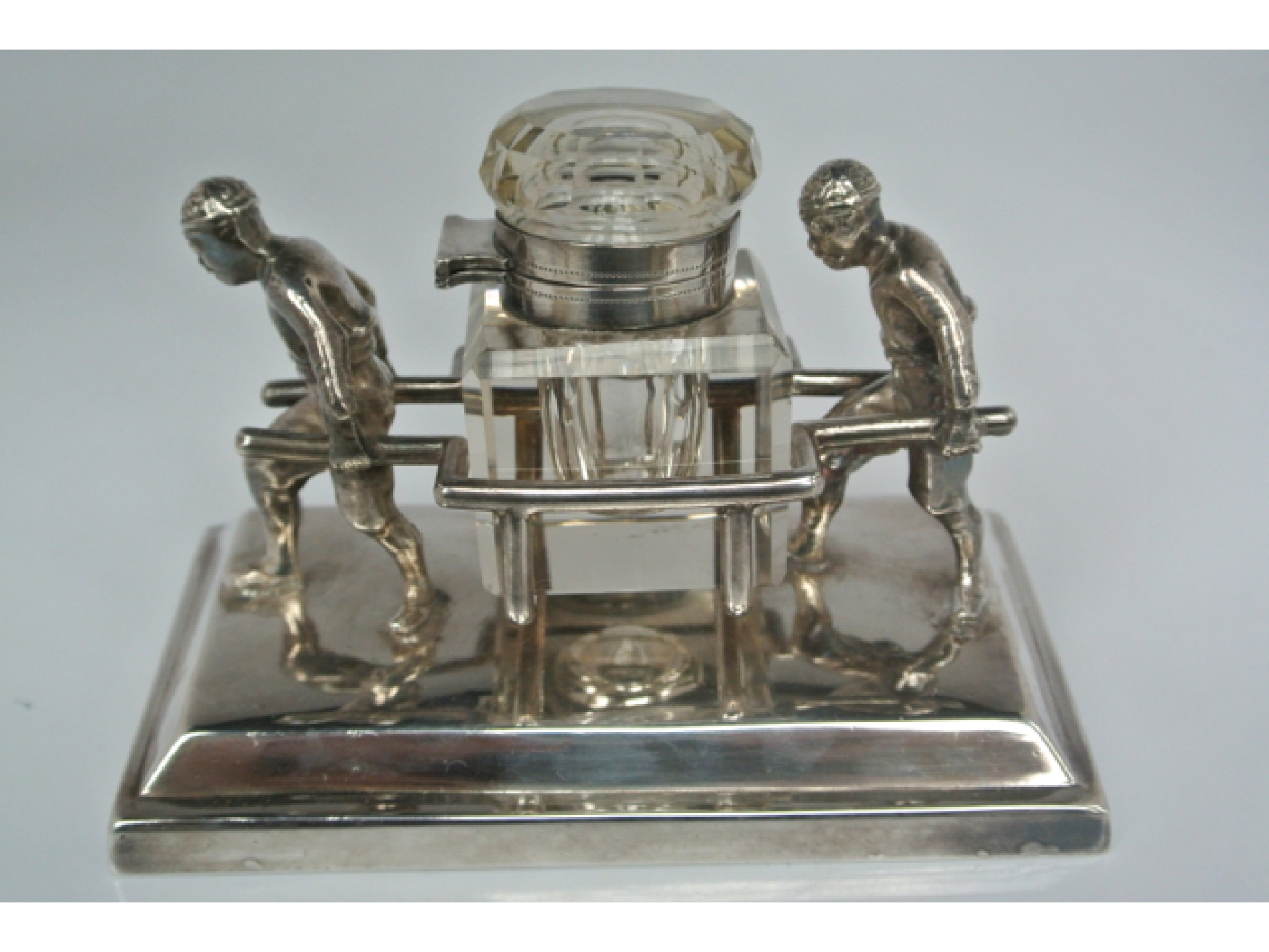 Appraisal: A Victorian silver plated and cut glass inkwell and stand