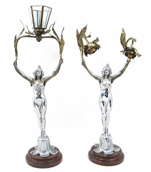 Appraisal: A pair of Art Nouveau style silvered-metal figural lamps one