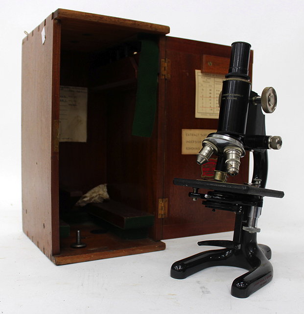 Appraisal: A COOKE TROUGHTON SIMS LTD BLACK LACQUERED STUDENT'S MICROSCOPE numbered