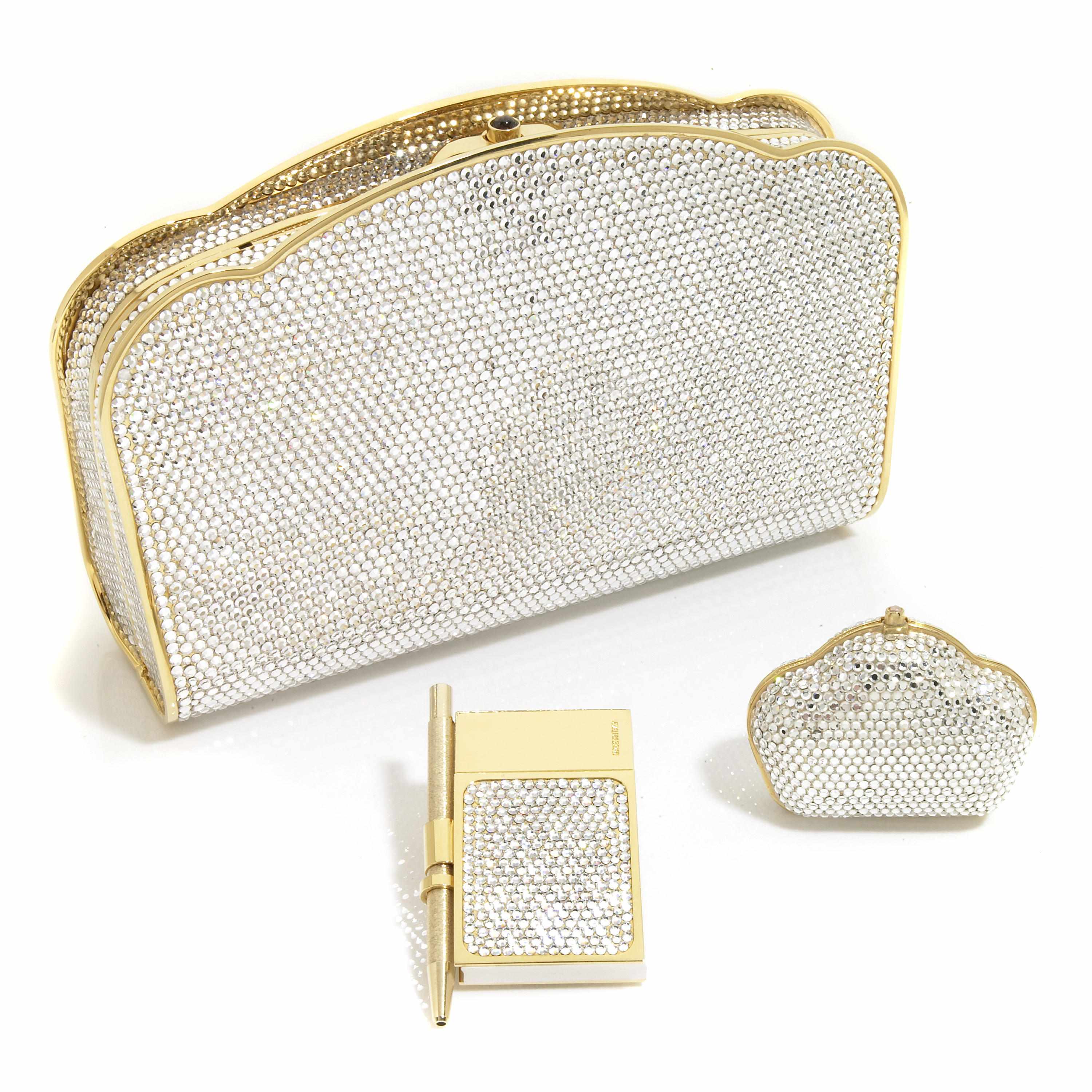 Appraisal: A silver crystal purse with gold colored metal scalloped detailing