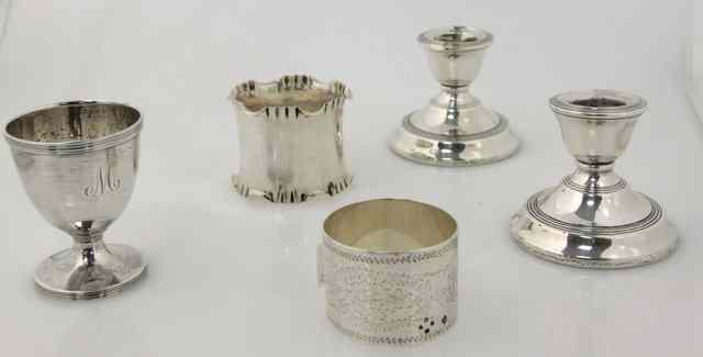 Appraisal: A pair of silver desk candlesticks Birmingham an egg cup