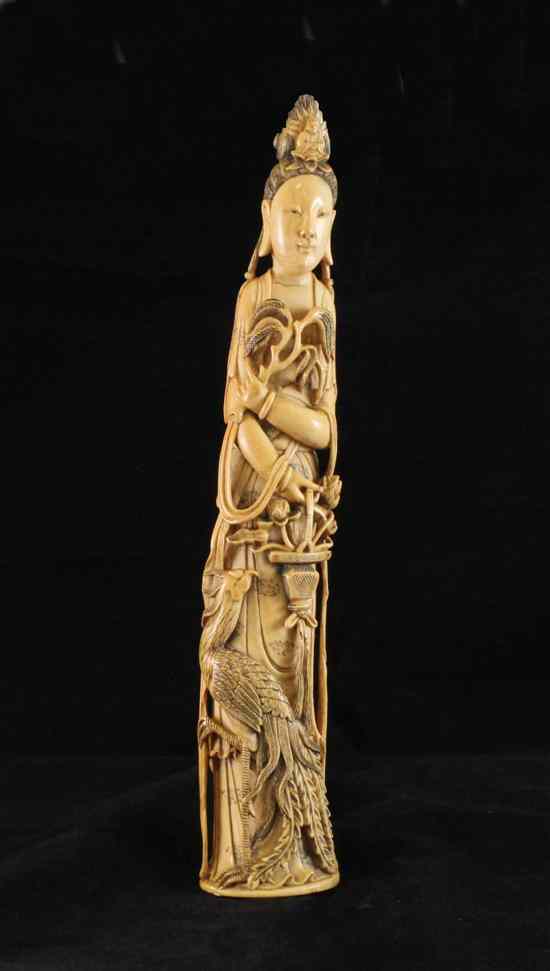 Appraisal: A Chinese ivory tusk carving of Guanyin early th century