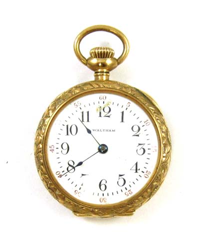 Appraisal: AMERICAN WALTHAM FOURTEEN KARAT GOLD OPENFACE POCKET WATCH Ruby model