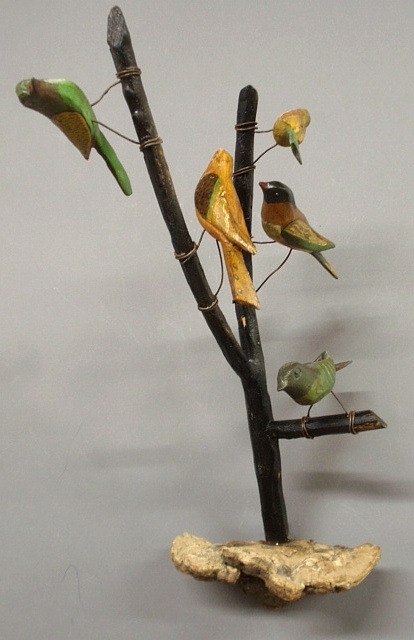 Appraisal: - Hanging folk art carved and paint decorated bird tree