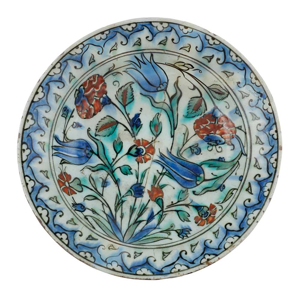 Appraisal: AN IZNIK POTTERY DISH WITH TULIPS CARNATIONS AND ROSES OTTOMAN