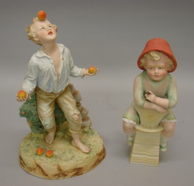 Appraisal: -Male child Heubach Figurines Both figurines are marked with the