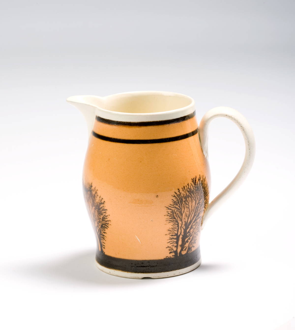 Appraisal: BRITISH CREAMWARE MOCHAWARE MILK JUG CIRCA Surrounded by dendritic trees