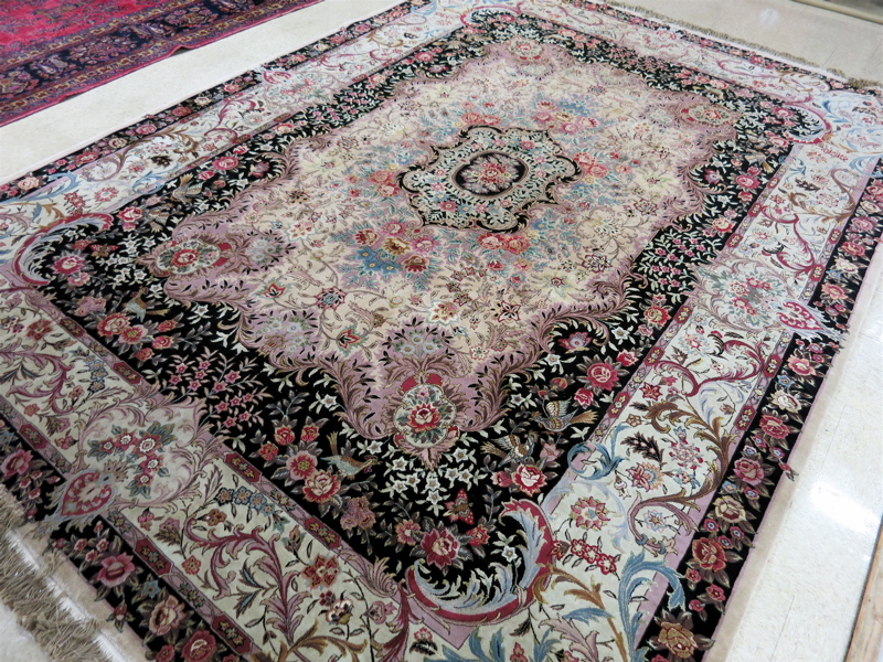 Appraisal: FINE ORIENTAL WOOL SILK CARPET Indo-Persian floral and central floral