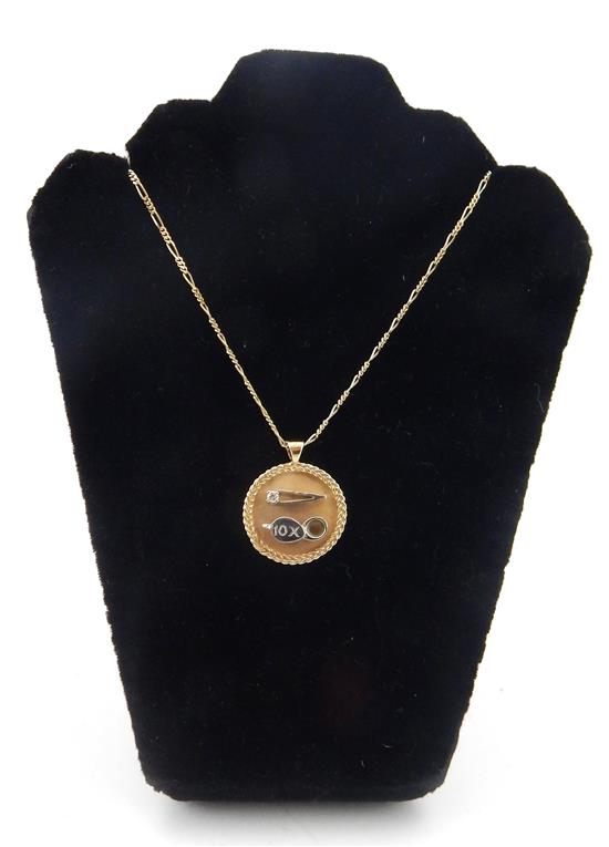 Appraisal: JEWELRY K yellow gold pendant with chain round pendant with