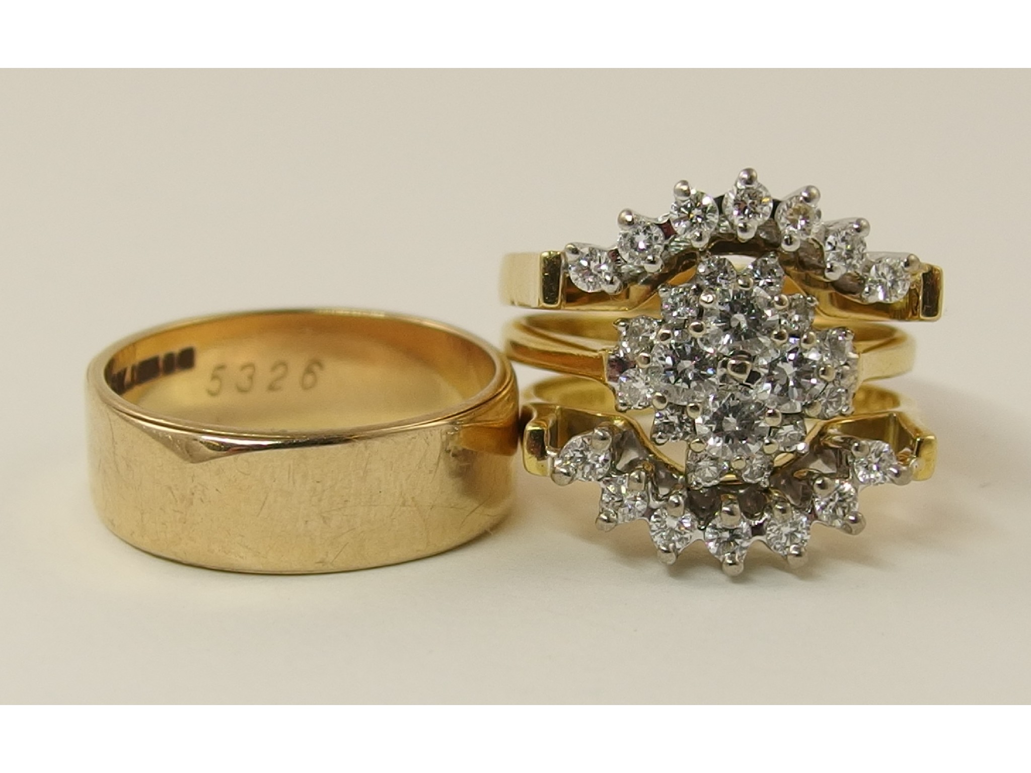 Appraisal: An ct three part diamond cluster ringor engagement and eternity