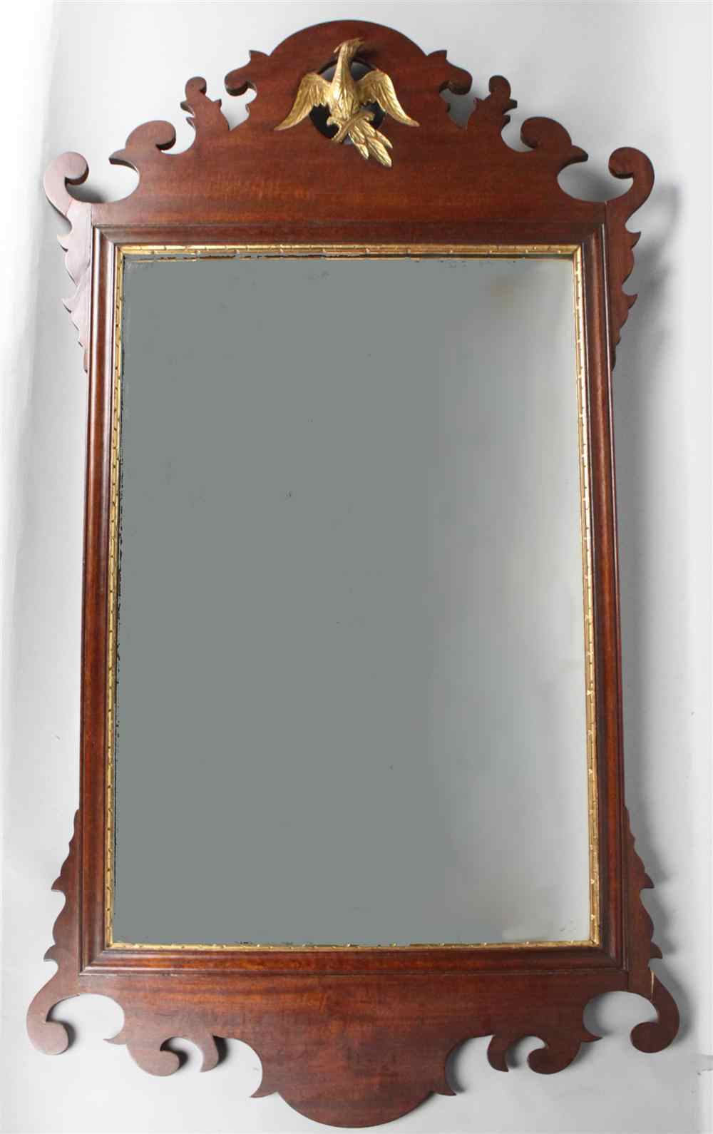 Appraisal: COLONIAL REVIVAL CHIPPENDALE MAHOGANY AND GILT MIRROR The carved and