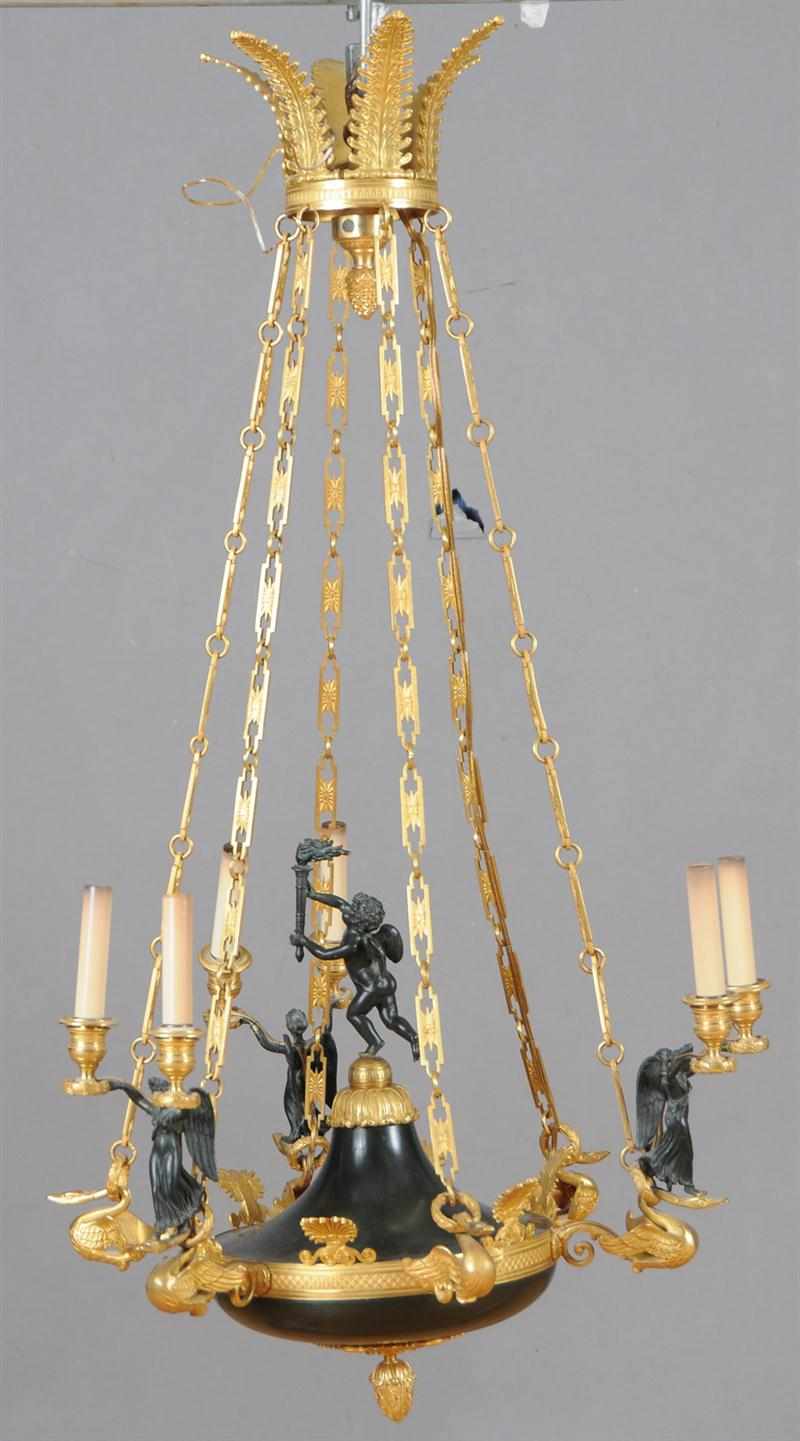 Appraisal: EMPIRE STYLE PATINATED BRONZE AND GILT-BRONZE SIX-LIGHT CHANDELIER The flattened