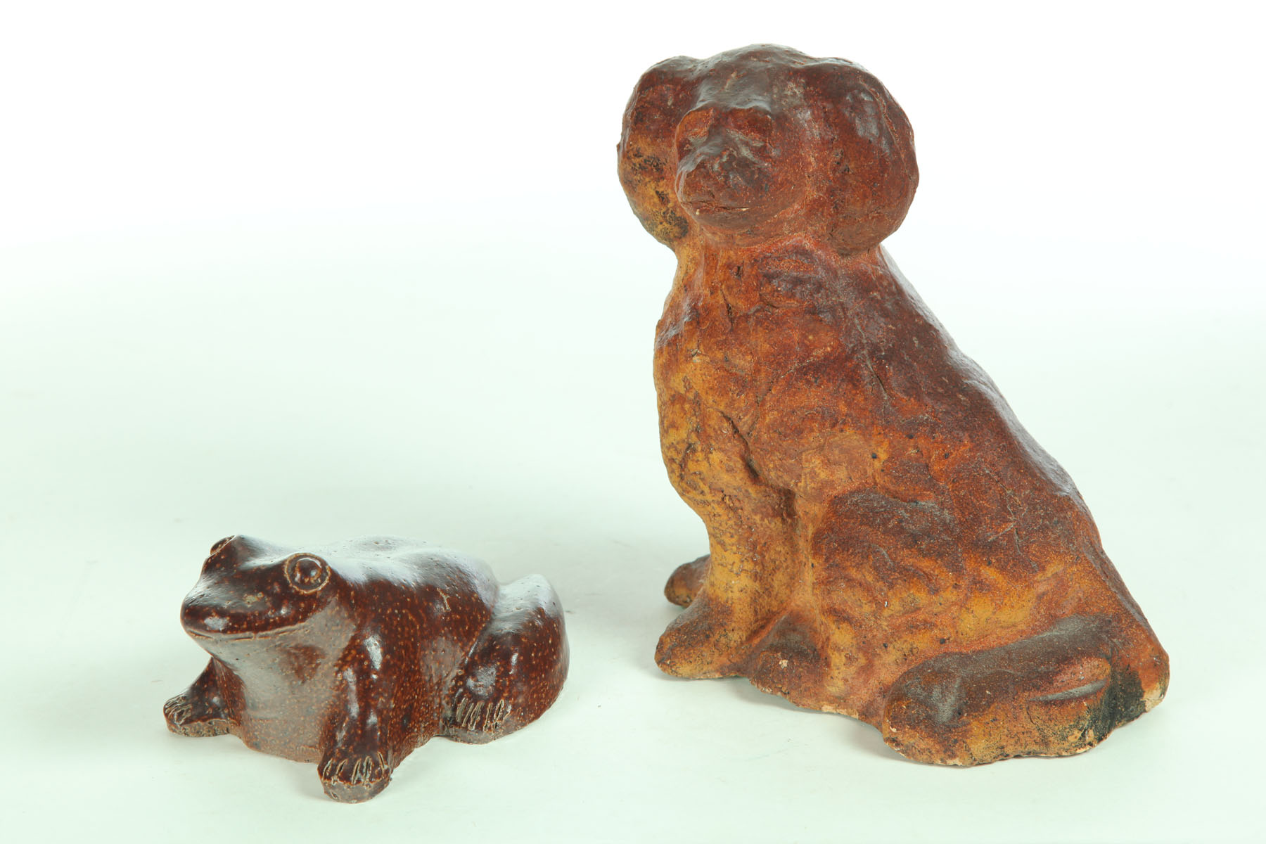 Appraisal: SEWERTILE DOG AND FROG Ohio early th century Roughly molded