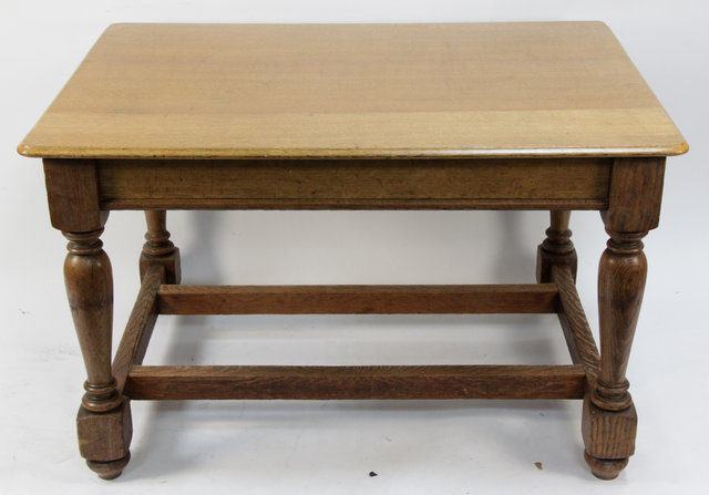 Appraisal: An oak table on turned legs and square stretchers cm