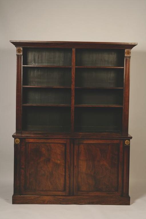 Appraisal: A PAIR OF GEORGE IV ROSEWOOD AND ORMOLU-MOUNTED LIBRARY BOOKCASES