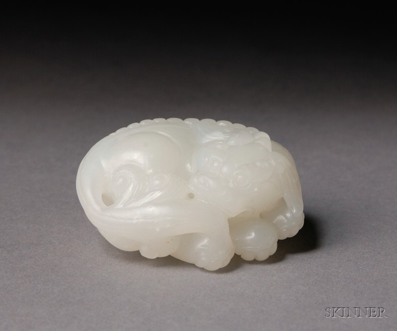 Appraisal: Jade Carving China th century pure white stone depicting a