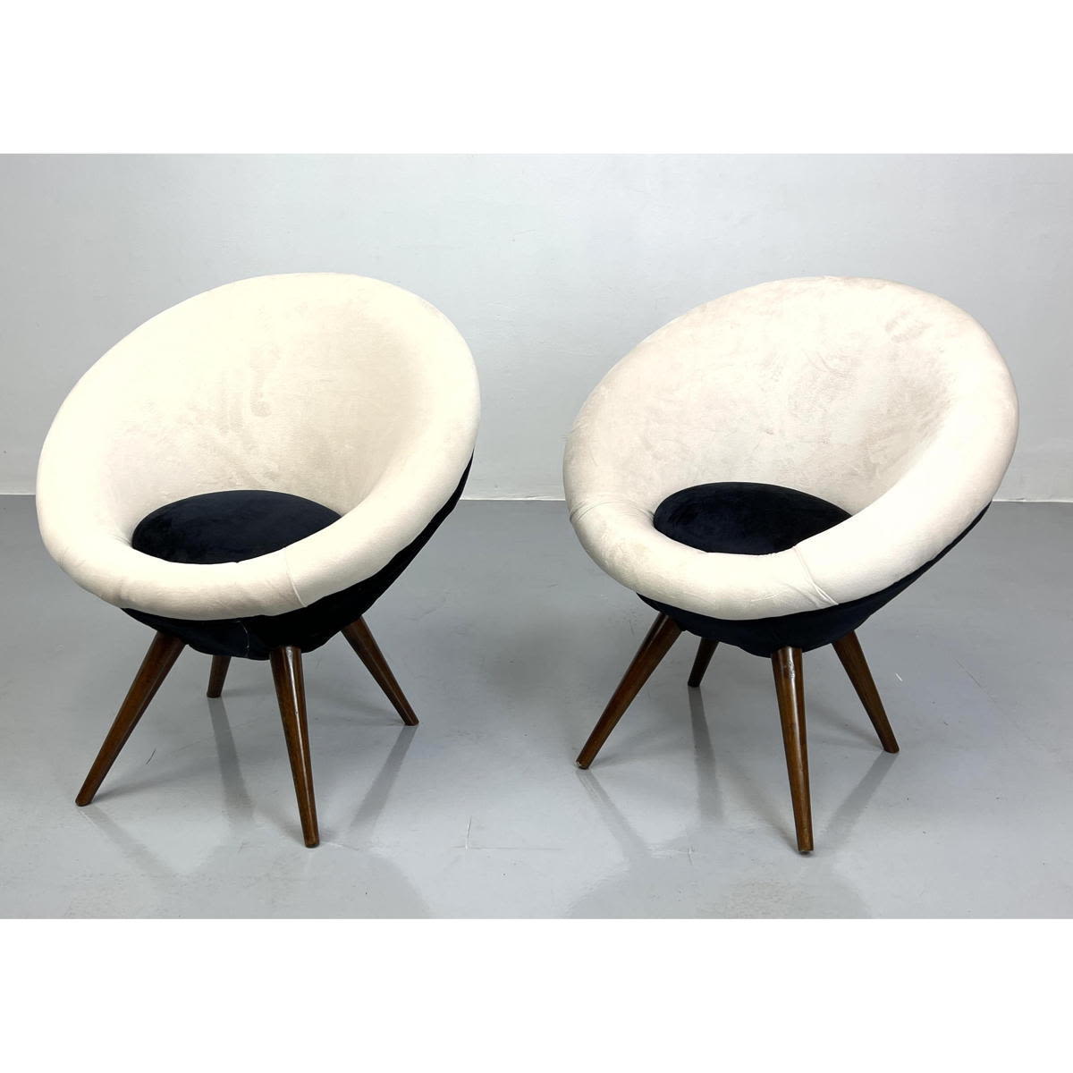 Appraisal: Pair Contemporary Jean Royere Style Egg Chairs on Tapered Angled