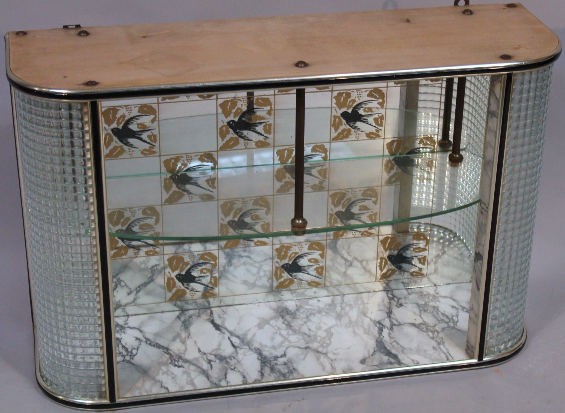 Appraisal: A 's glass hanging cabinet with a melamine finish surround