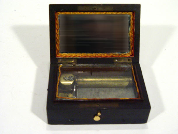 Appraisal: Victorian three tune music box initialled HMG to interior in