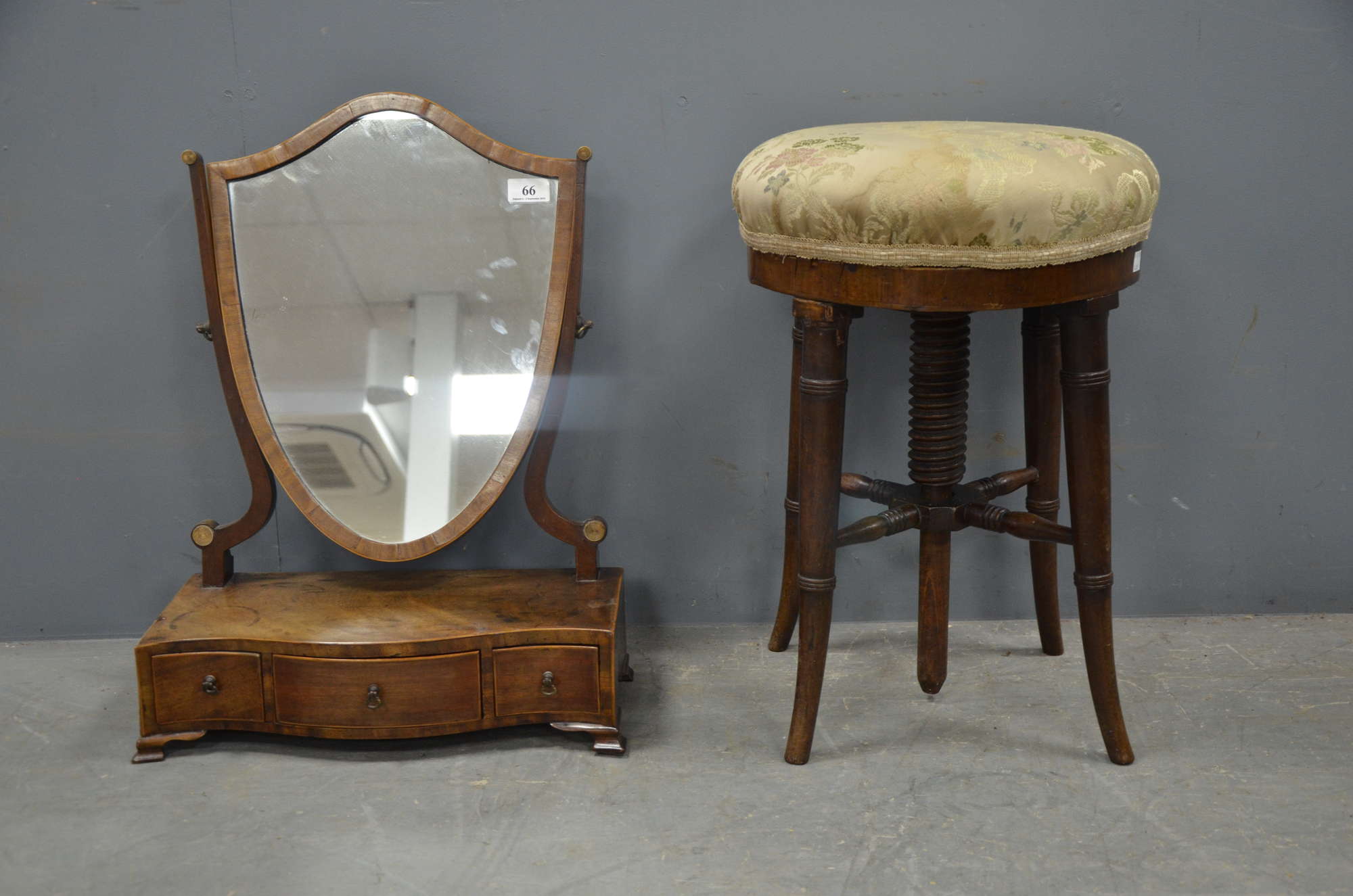 Appraisal: Walnut shield shaped dressing table mirror and an adjustable piano