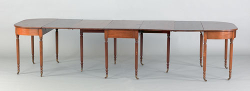 Appraisal: Pennsylvania Sheraton mahogany three part dining table ca with rounded