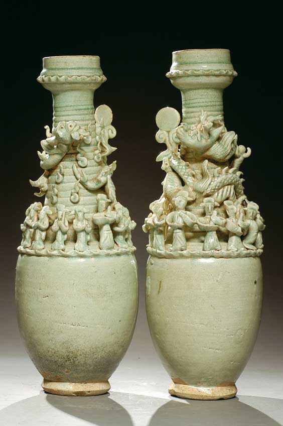 Appraisal: PAIR SONG YINGQING FUNERARY URNS Pair tall and very elaborately