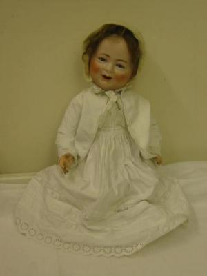 Appraisal: A Das Lachende bisque headed baby character doll with blue