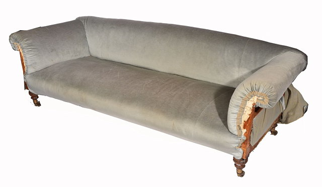 Appraisal: A HOWARD SONS LATE VICTORIAN CHESTERFIELD SOFA upholstered in light