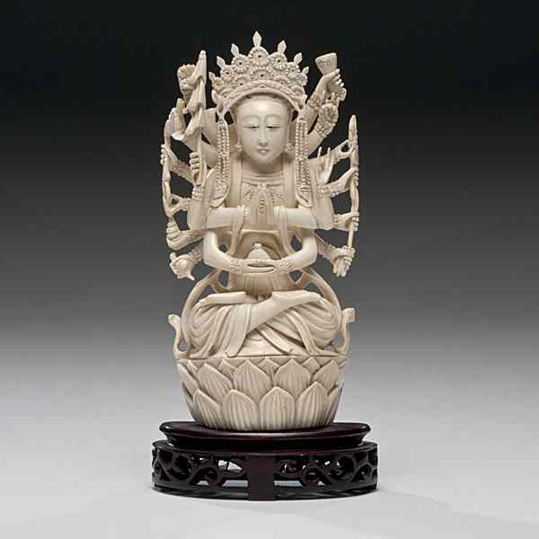 Appraisal: Chinese Carved Ivory Deity Chinese A carved ivory deity on